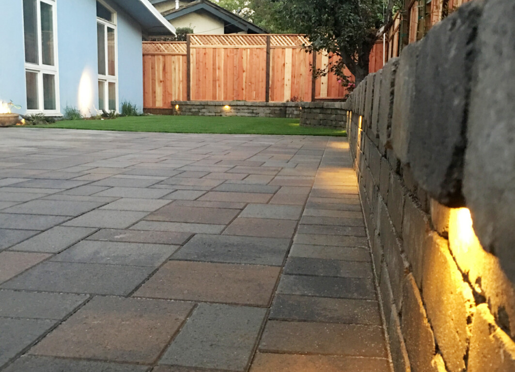 Beautiful finished concrete patio with outdoor lighting in Delano