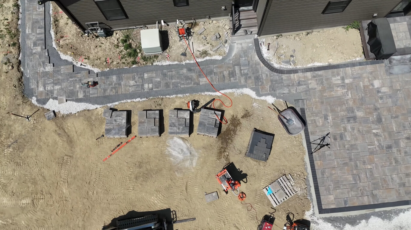 Aerial view of stamped concrete patio installation in Delano